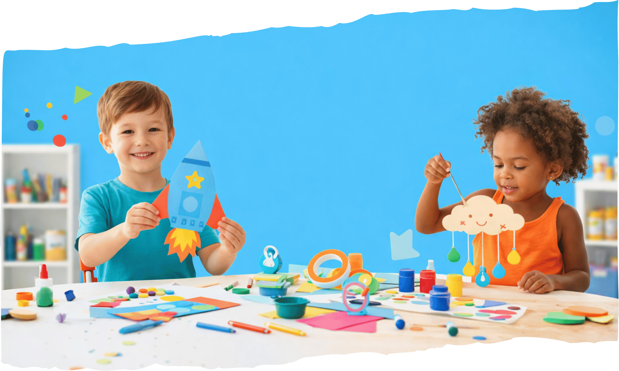 Hero Image – Kids Kits Two kids playing with various items and toys at a table.