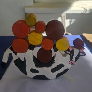 Real image of a kids wooden toy (Brave Bessie).